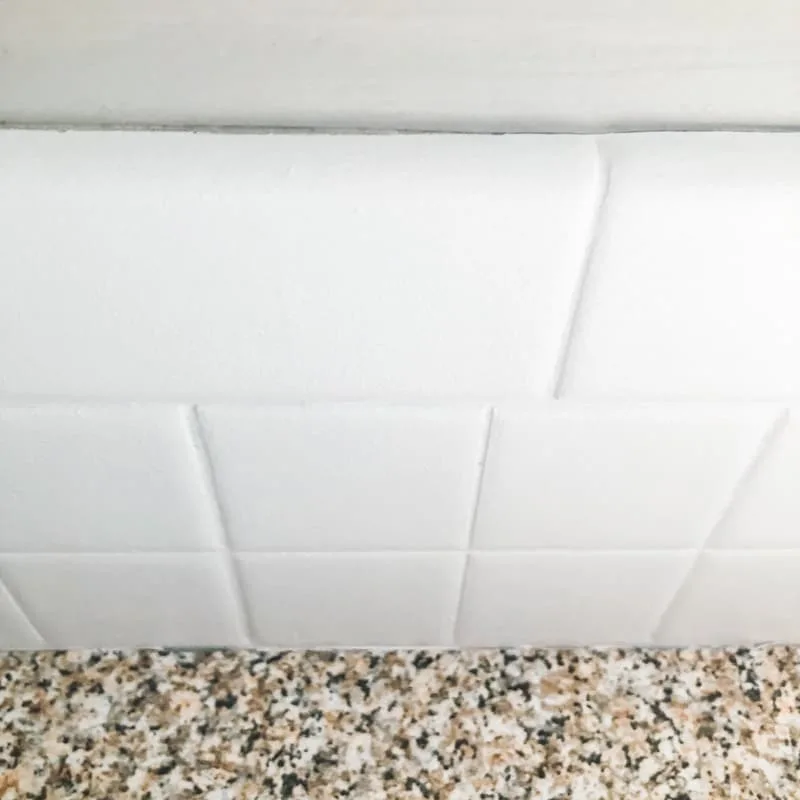 gap in top of backsplash tile paint