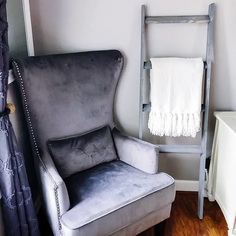 DIY blanket ladder next to armchair