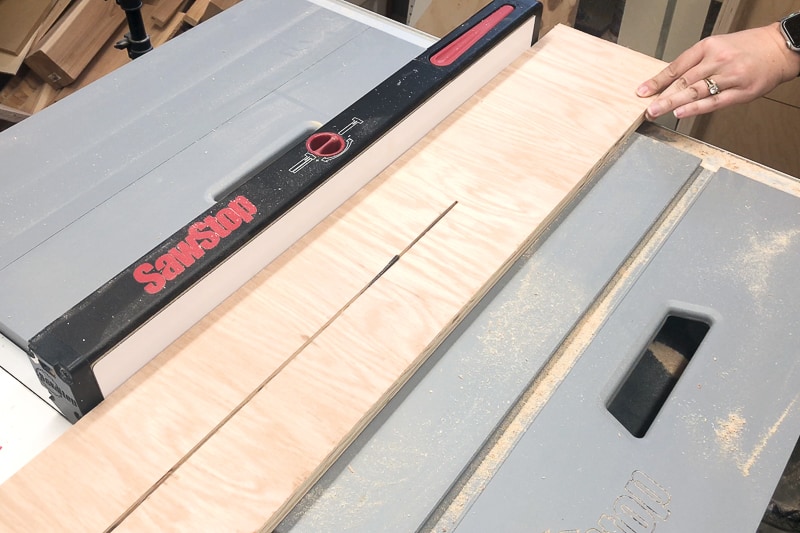 cutting slats for lumber rack out of plywood on the table saw