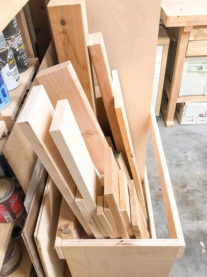 scrap wood storage cart against the wall of the workshop