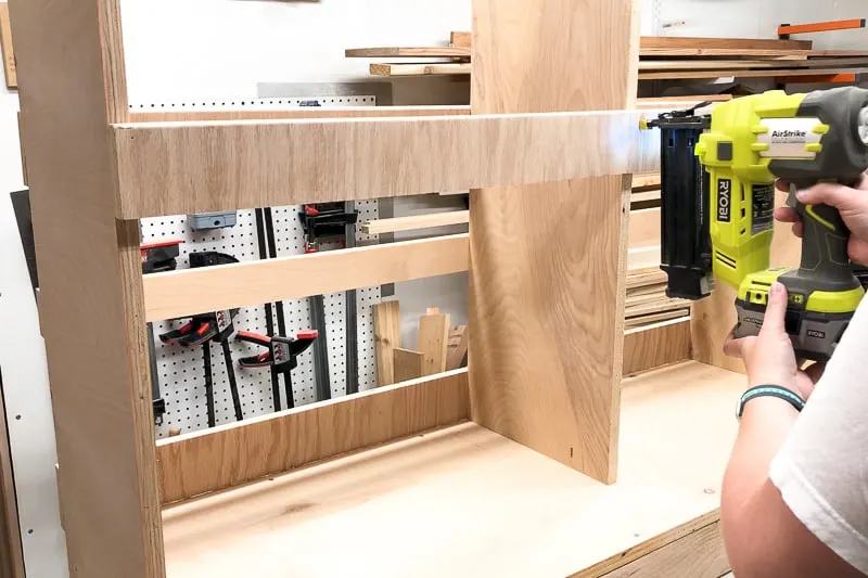 attaching slats to lumber cart with brad nailer