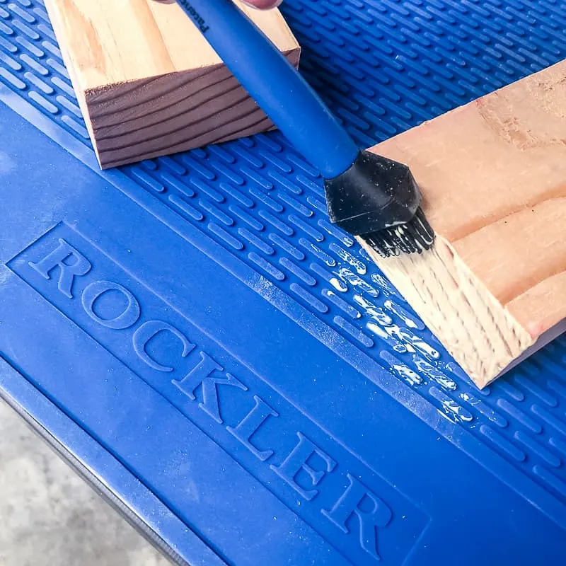 silicone mat on workbench top with wood glue