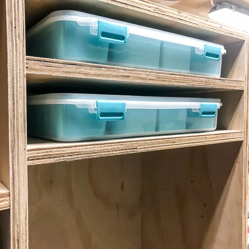 small parts bins with their own shelves in a DIY workbench