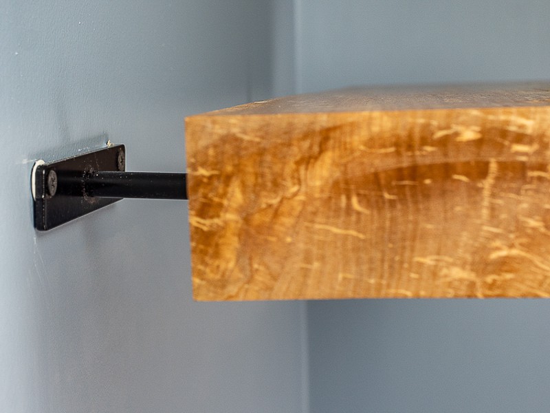 live edge floating shelf bracket with slight upward angle