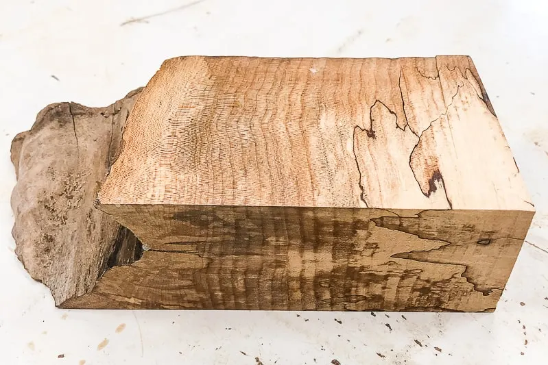 testing various finishes on scrap piece of live edge board
