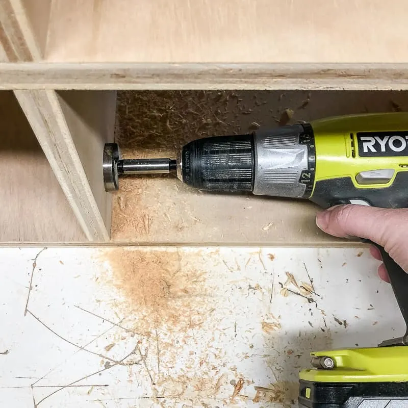 drilling hole in shelf divider for cables