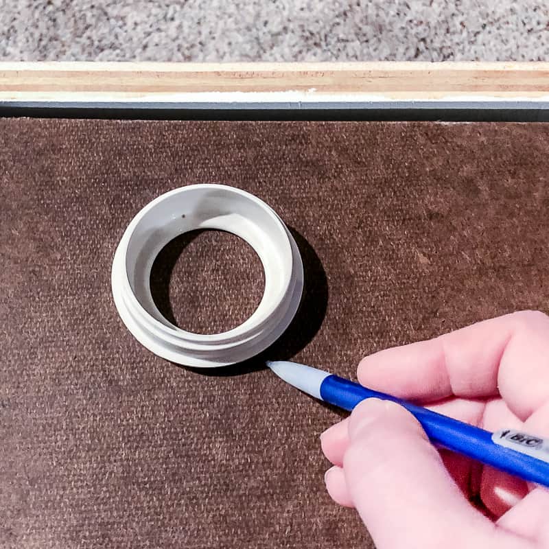 marking hole for cords on back of built in entertainment center