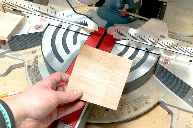 square of curly maple cut on the miter saw