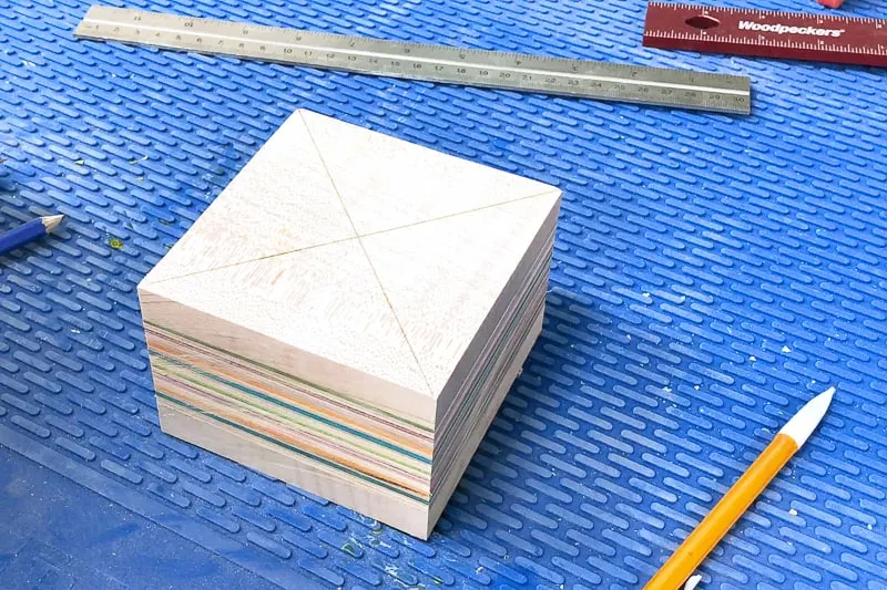 marking the center of the square with an X