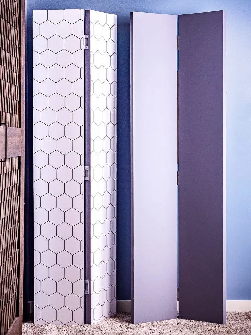 DIY privacy screens with gray and hexagon patterned sides showing