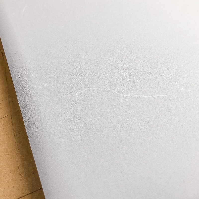 scratched contact paper