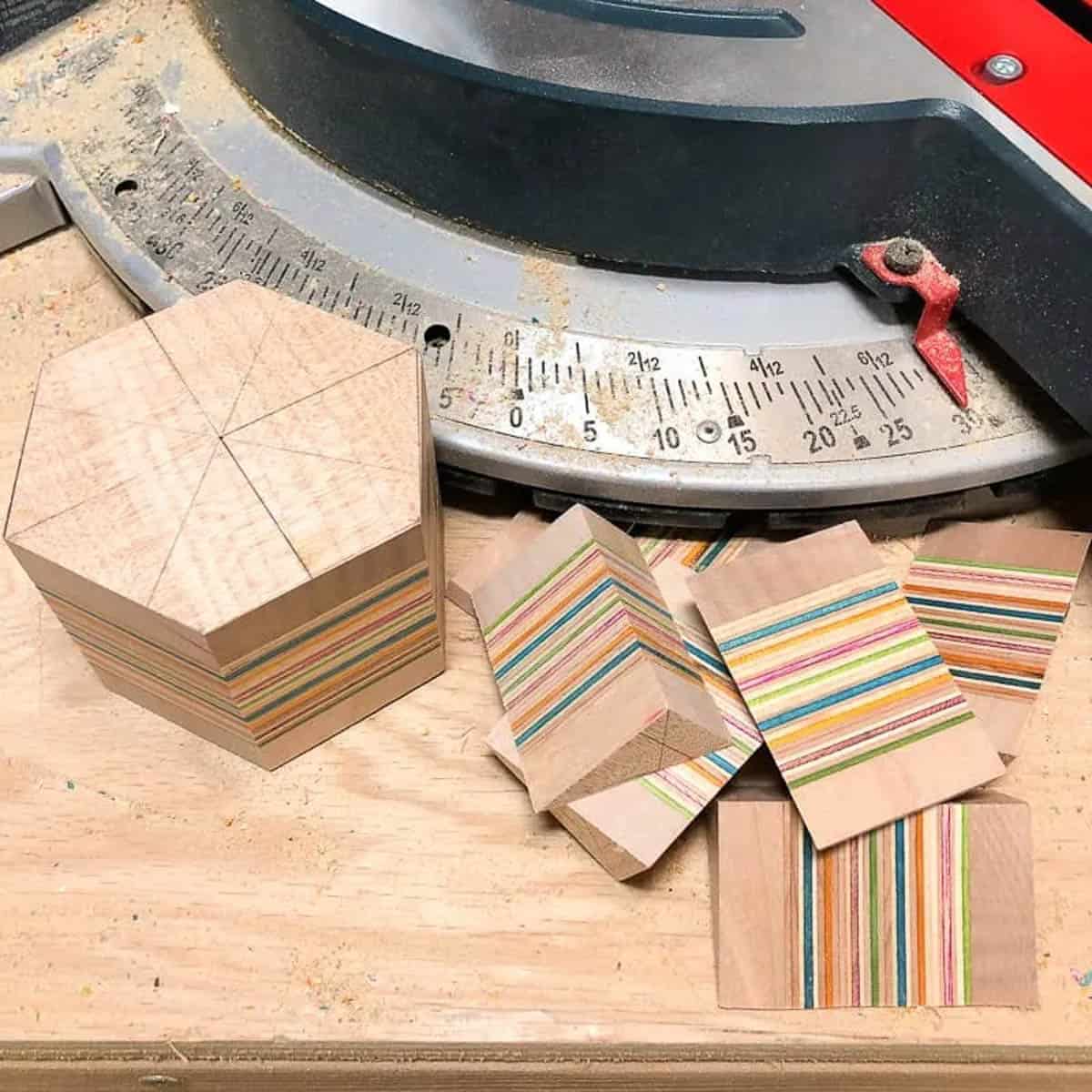 miter saw set to 30 degrees to cut hexagon shape for DIY candle holder