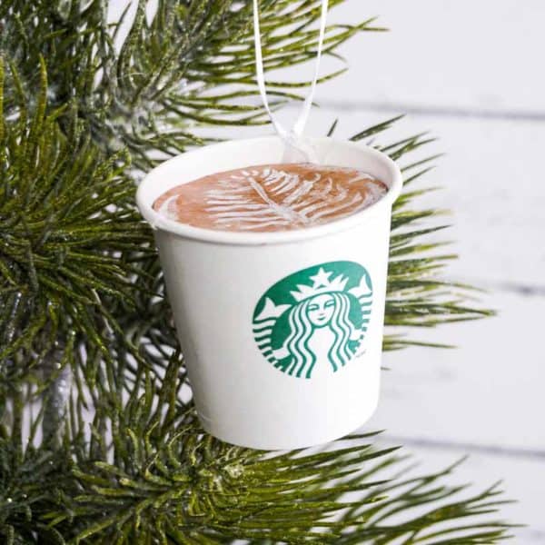 DIY Starbucks ornament hanging on a Christmas tree