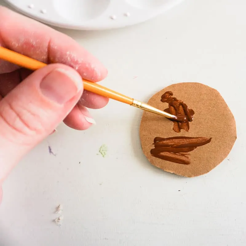 painting cardboard circle for coffee ornament