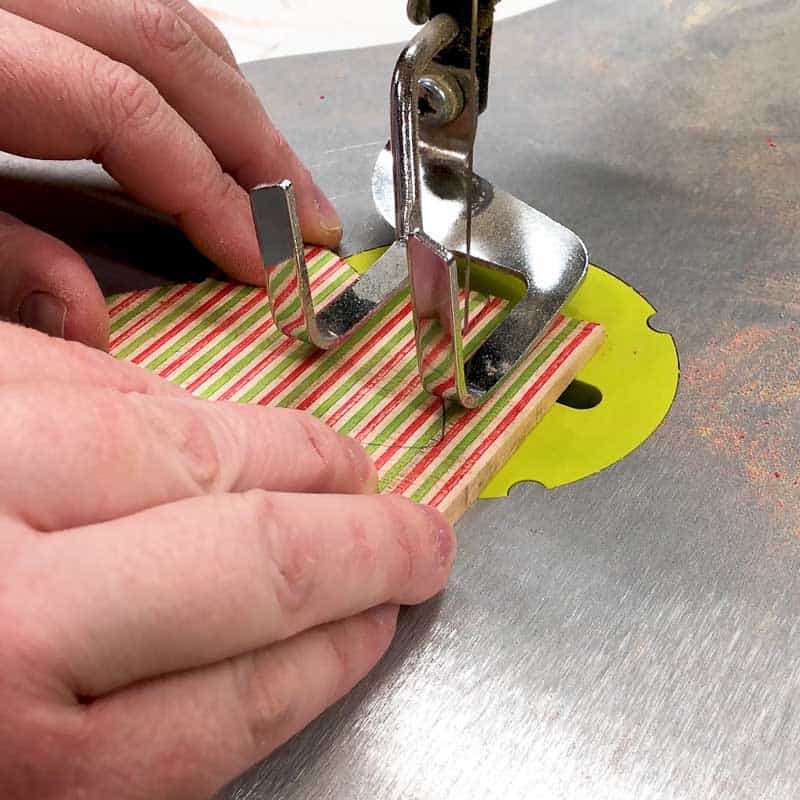 cutting out wooden ornaments on the scroll saw