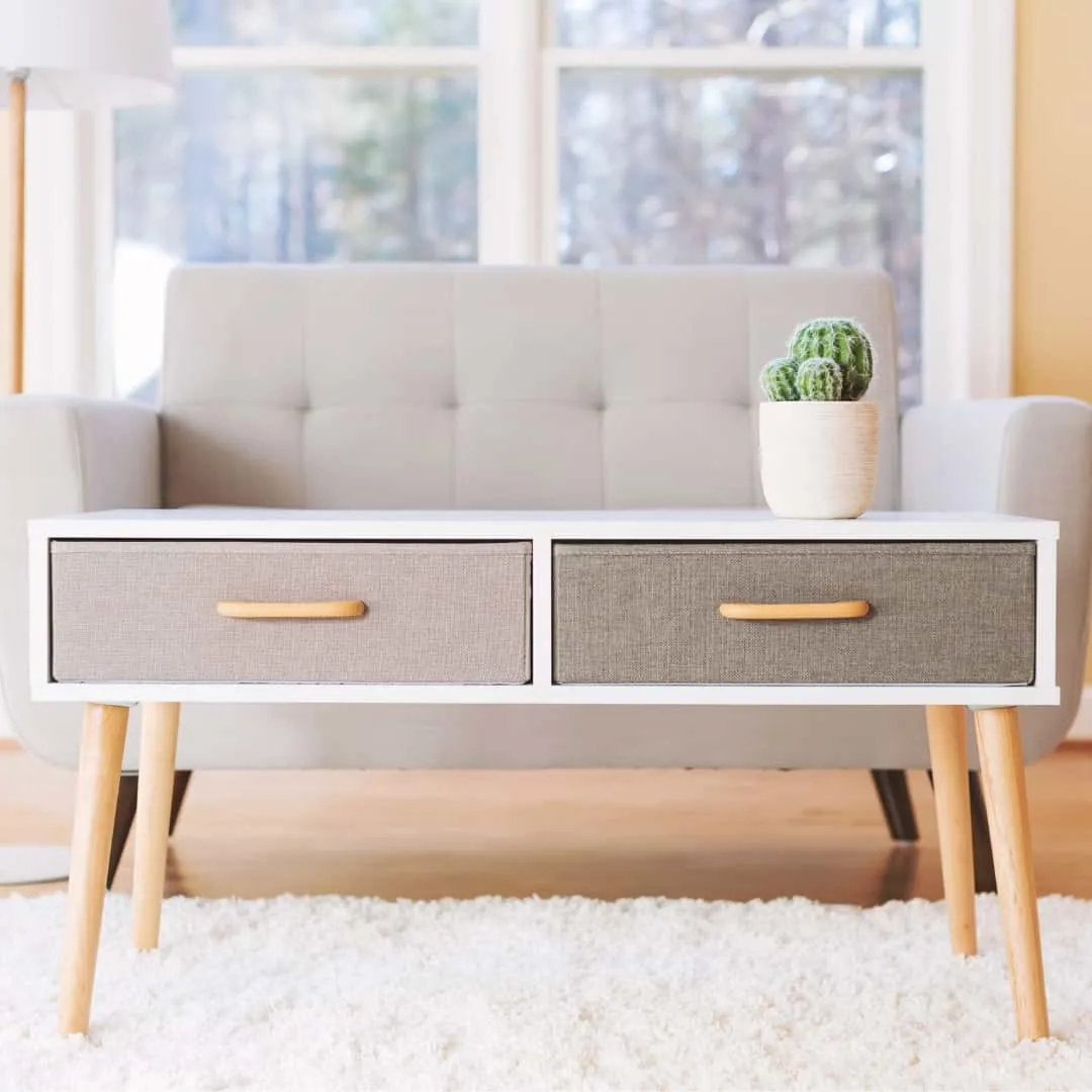 midcentury modern coffee table with angled legs screwed into place with hanger bolts
