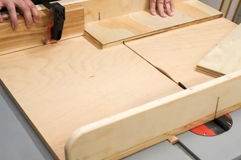 cutting grooves in DIY drawer organizer sides with a table saw and crosscut sled
