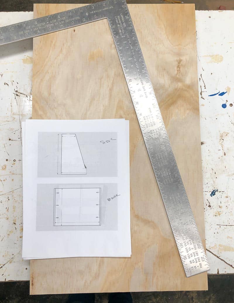 measure and mark the angled side of the DIY bookshelf according to the plans