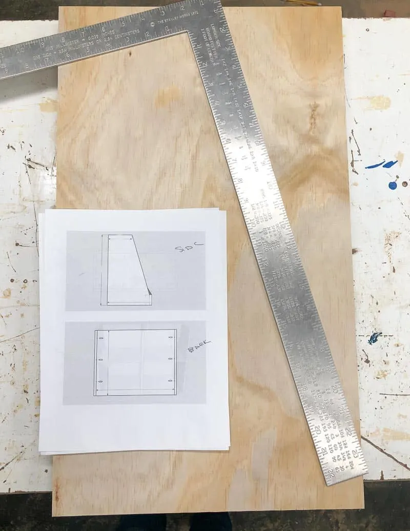 measure and mark the angled side of the DIY bookshelf according to the plans