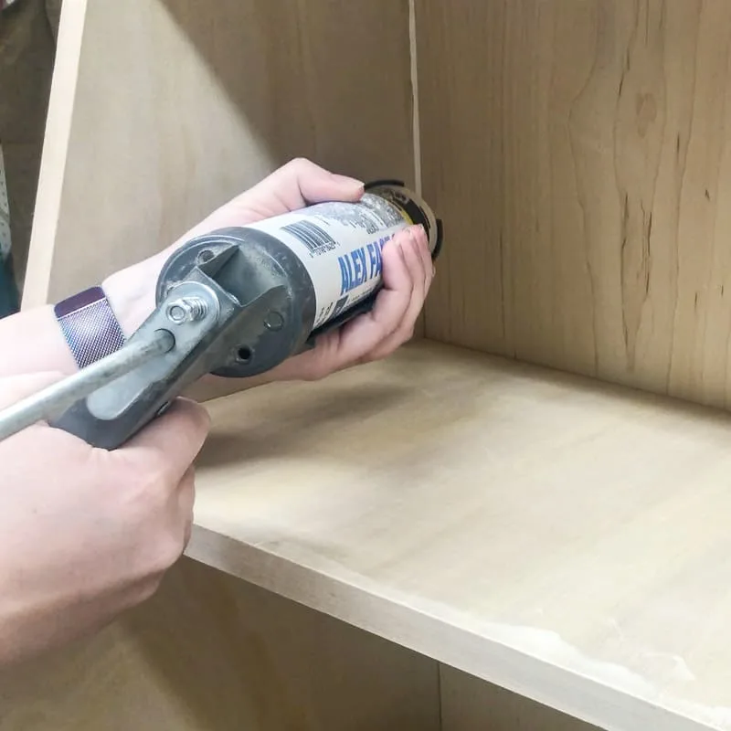Caulk the seams in your DIY furniture for a flawless painted finish.