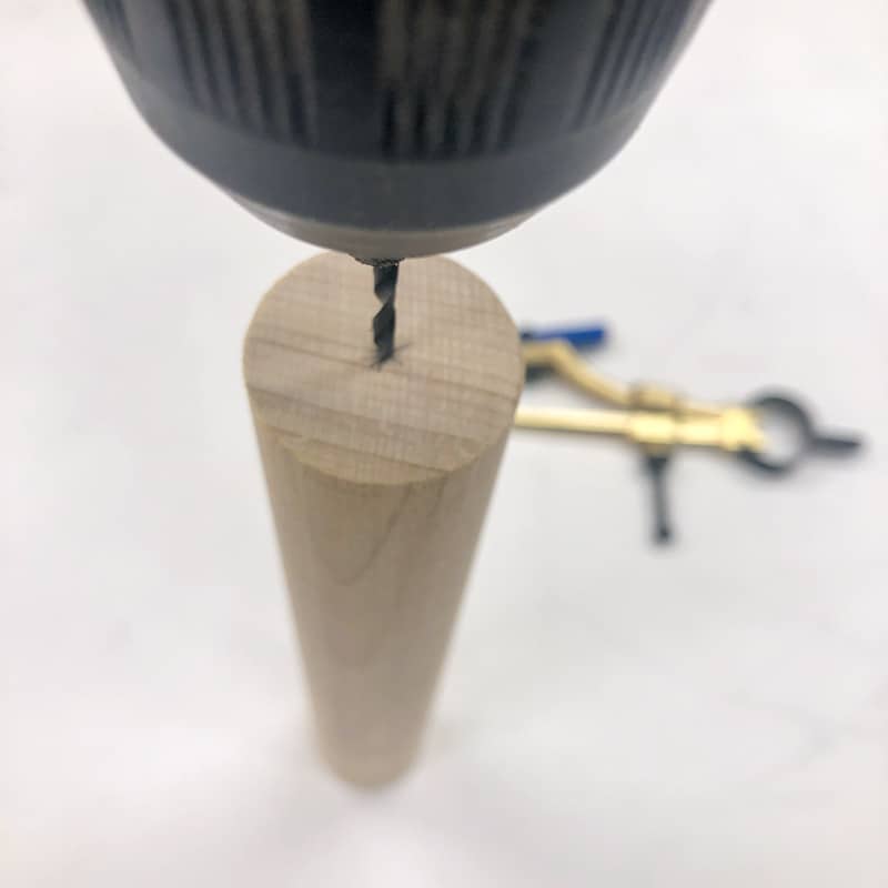 drilling pilot hole in end of dowel