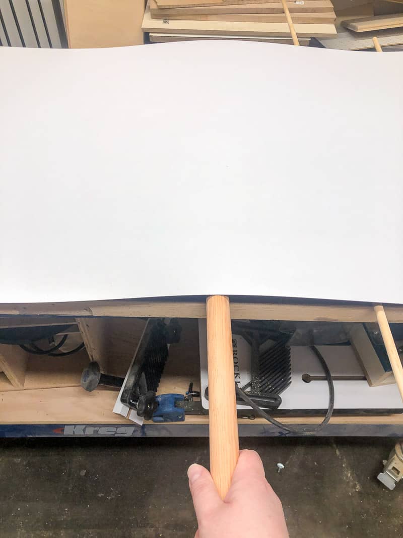 removing wooden dowel under laminate sheet