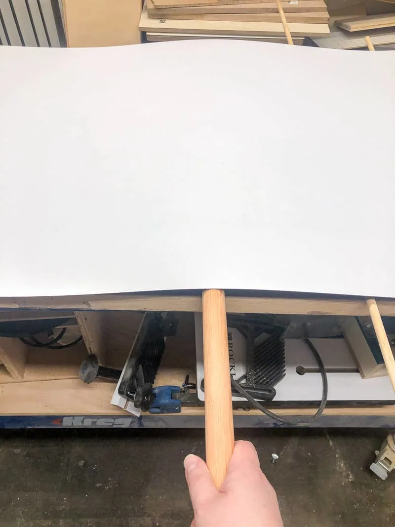 removing wooden dowel under laminate sheet