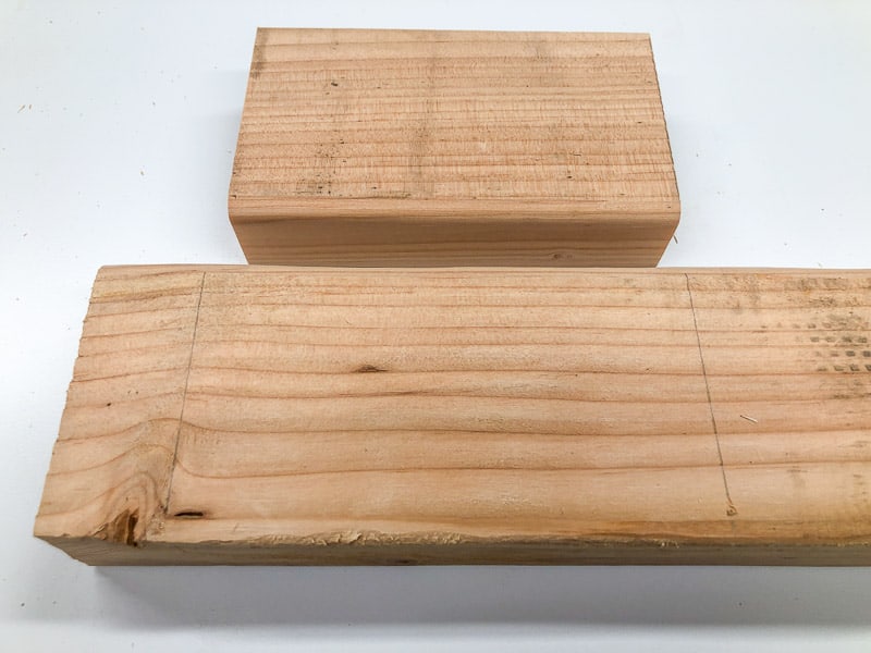 2x4 piece with cut lines marked