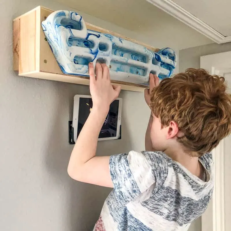 hangboard mount box on wall, installed with a French cleat