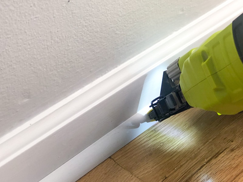 nailing quarter round trim to baseboards with brad nailer