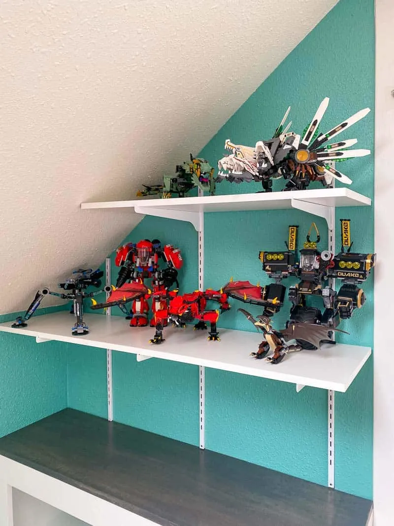 adjustable wall mounted shelves with Lego builds on display
