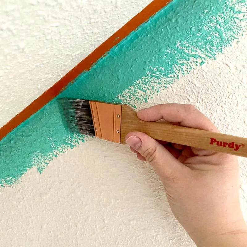 painting textured walls with Purdy paint brush