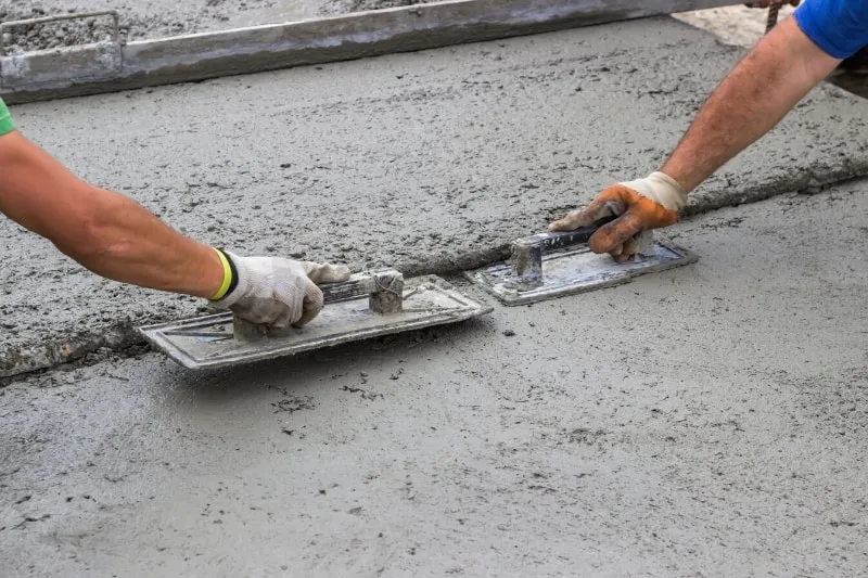 spreading a concrete patio