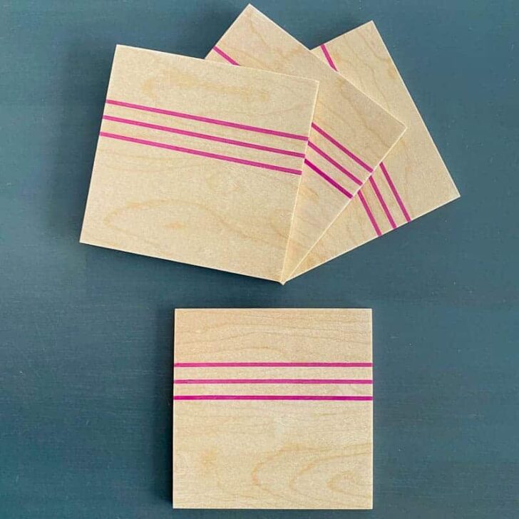 DIY wood coasters with skateboard veneer stripes