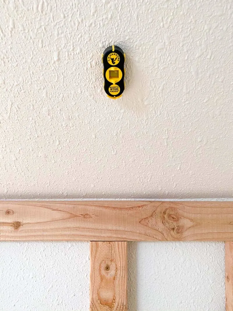 magnetic stud finder on wall