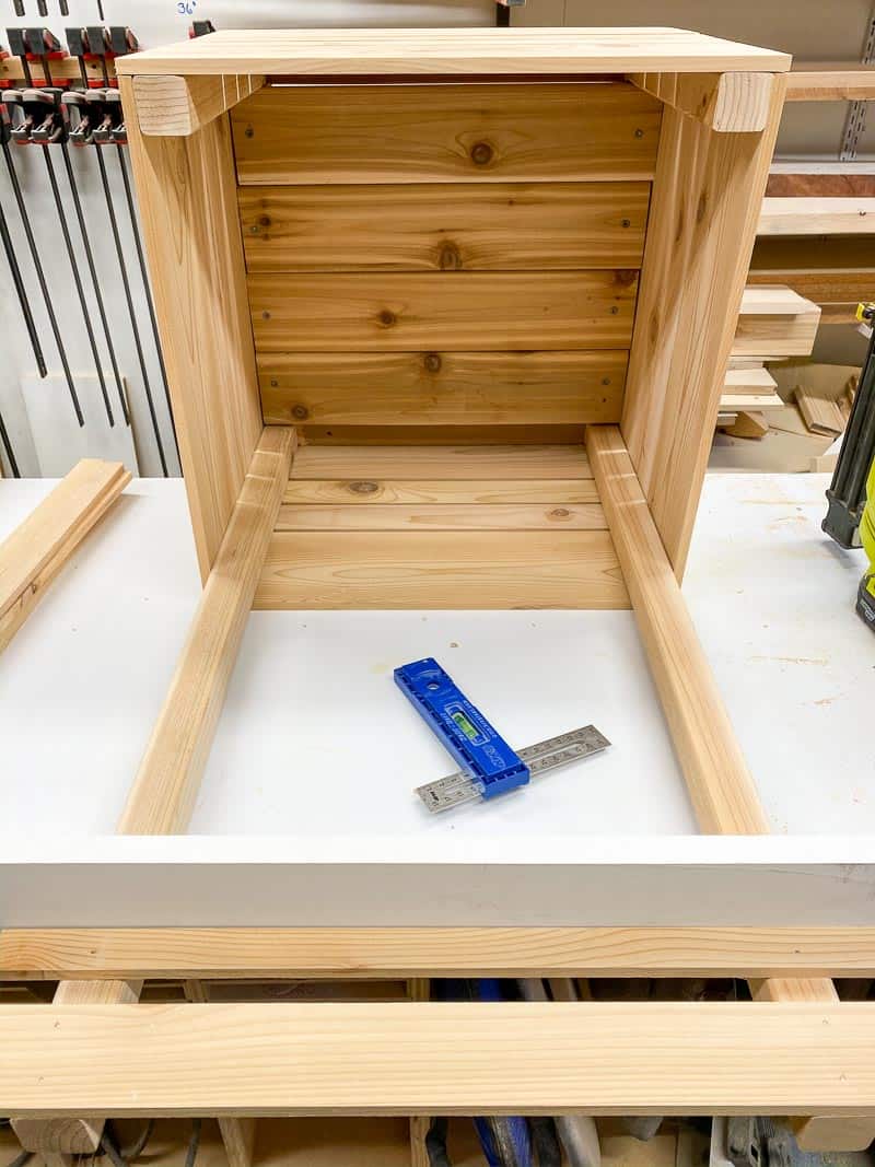 attaching slats to trellis on planter box