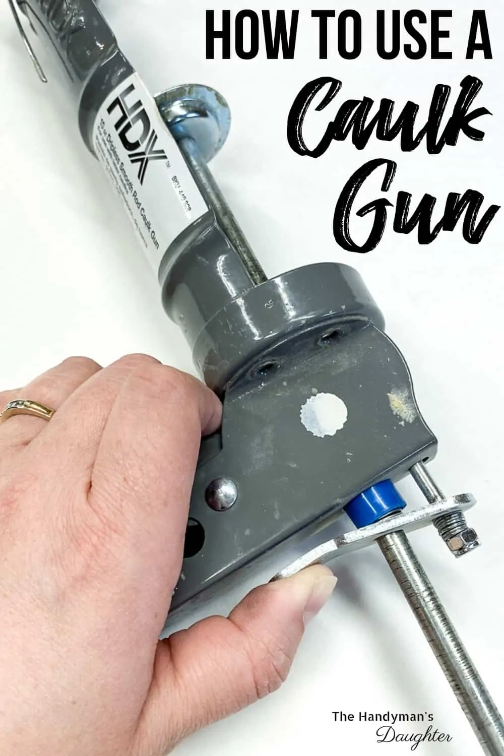 how to use a caulk gun with hand pressing the trigger