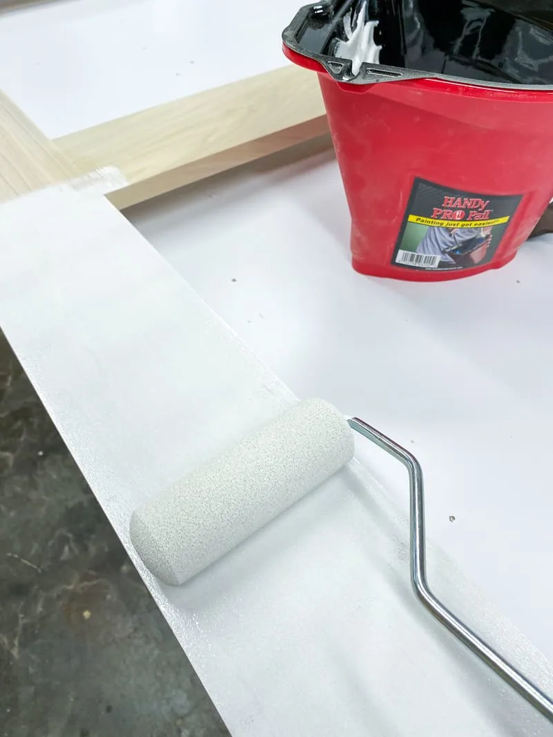 painting DIY screen door with 4" foam paint roller