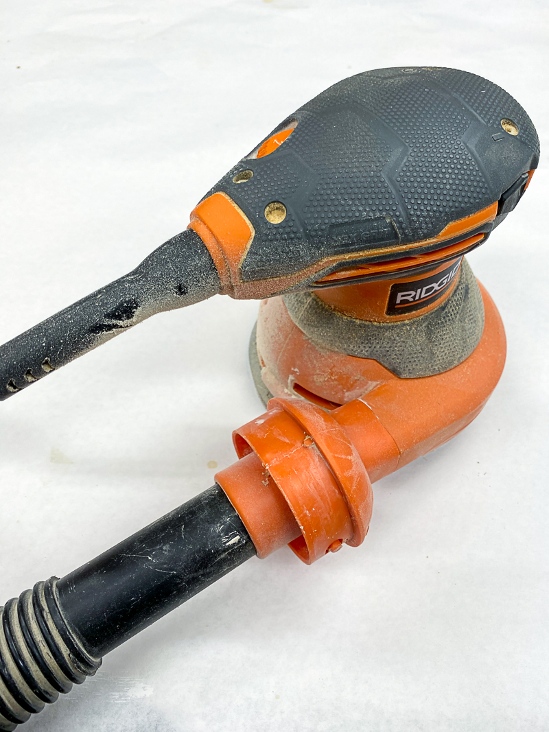 random orbital sander attached to shop vac