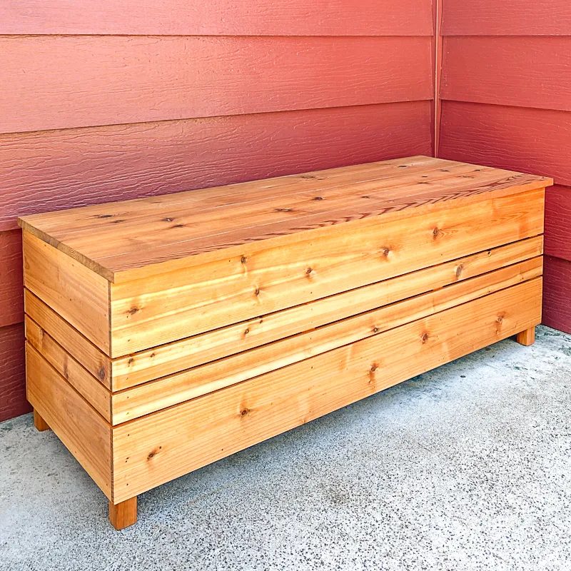 DIY outdoor storage box on front porch