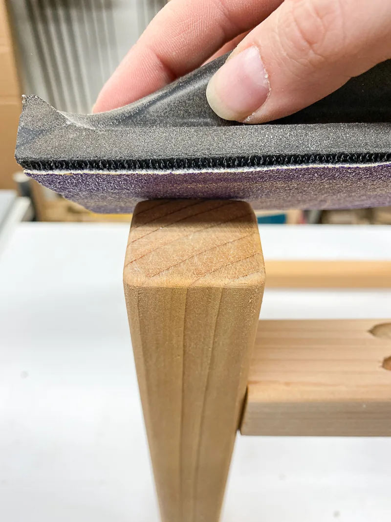 sanding bevel on bottom of legs of outdoor storage box