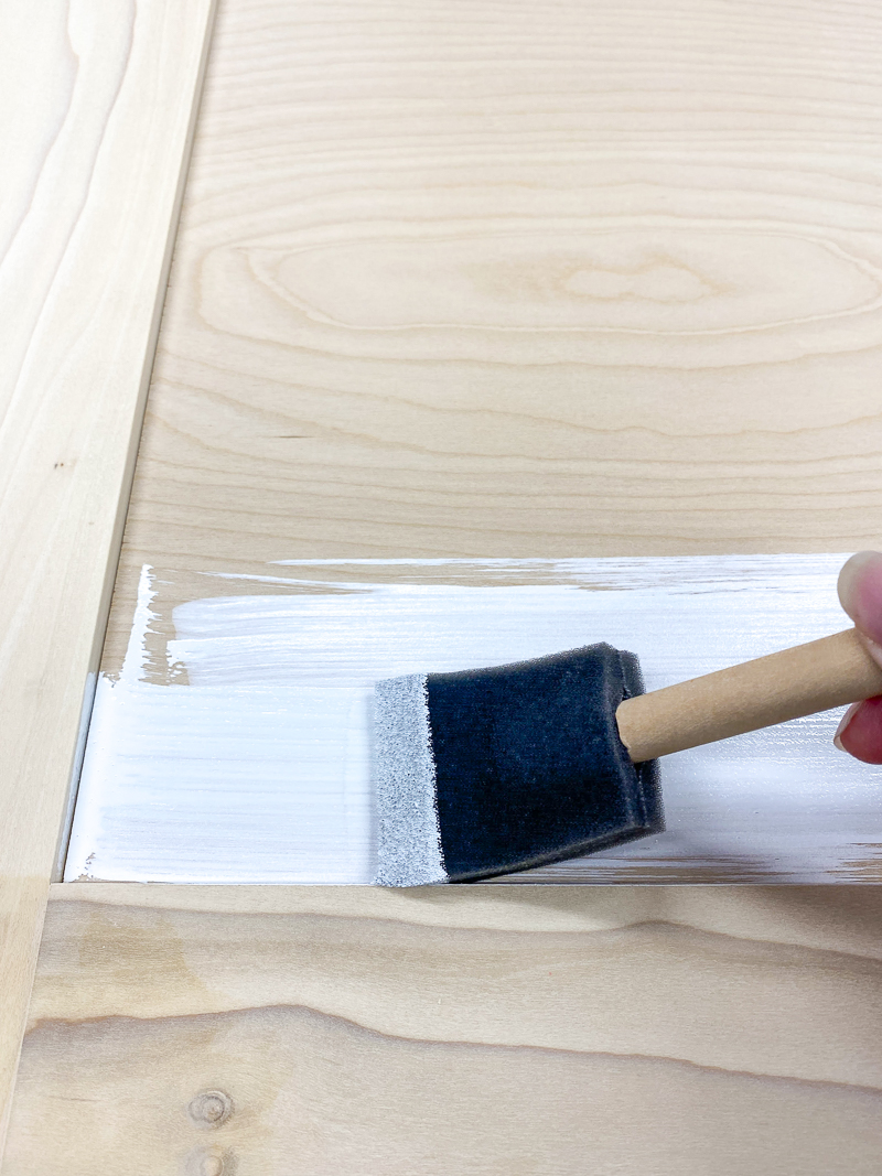 applying primer to bifold barn doors