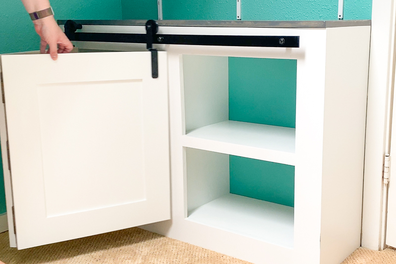 bifold barn doors on cabinet rolling open