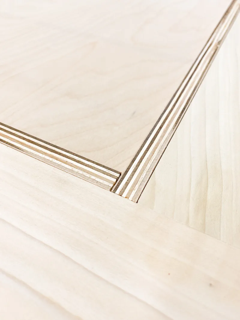 plywood spacers inside recess of cabinet doors