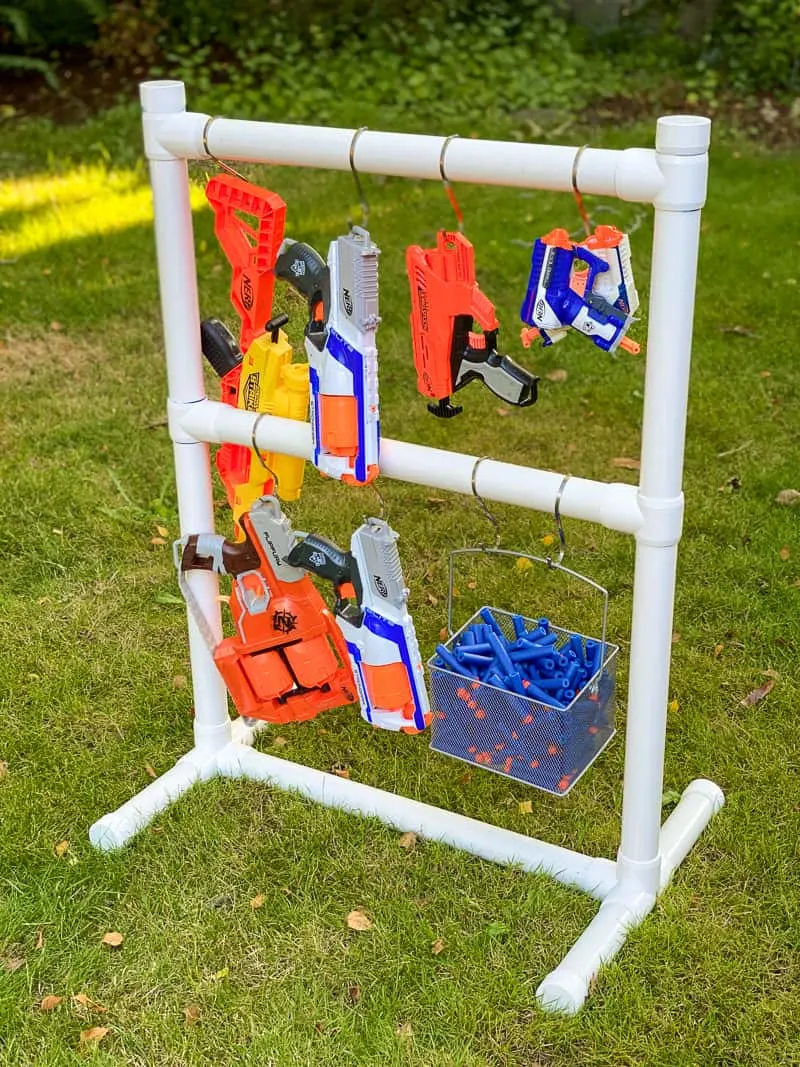DIY Nerf gun storage rack made from PVC pipe with basket for darts