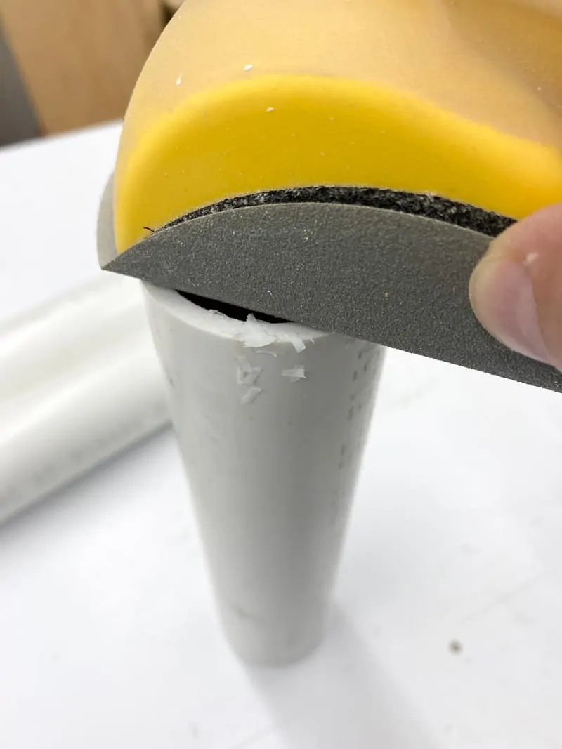 sanding cut ends of PVC pipe