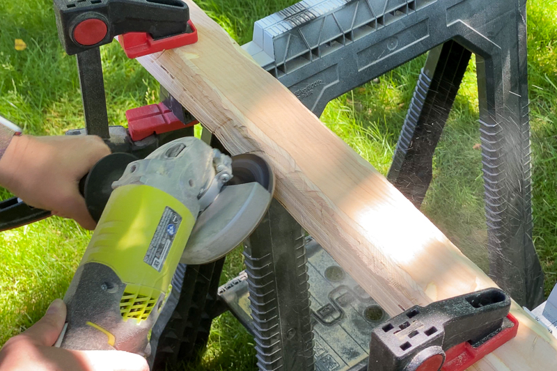 carving wooden climbing hold with an angle grinder