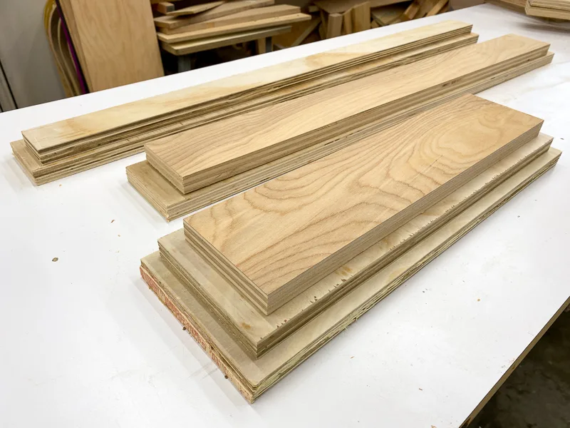 stacks of plywood on workbench