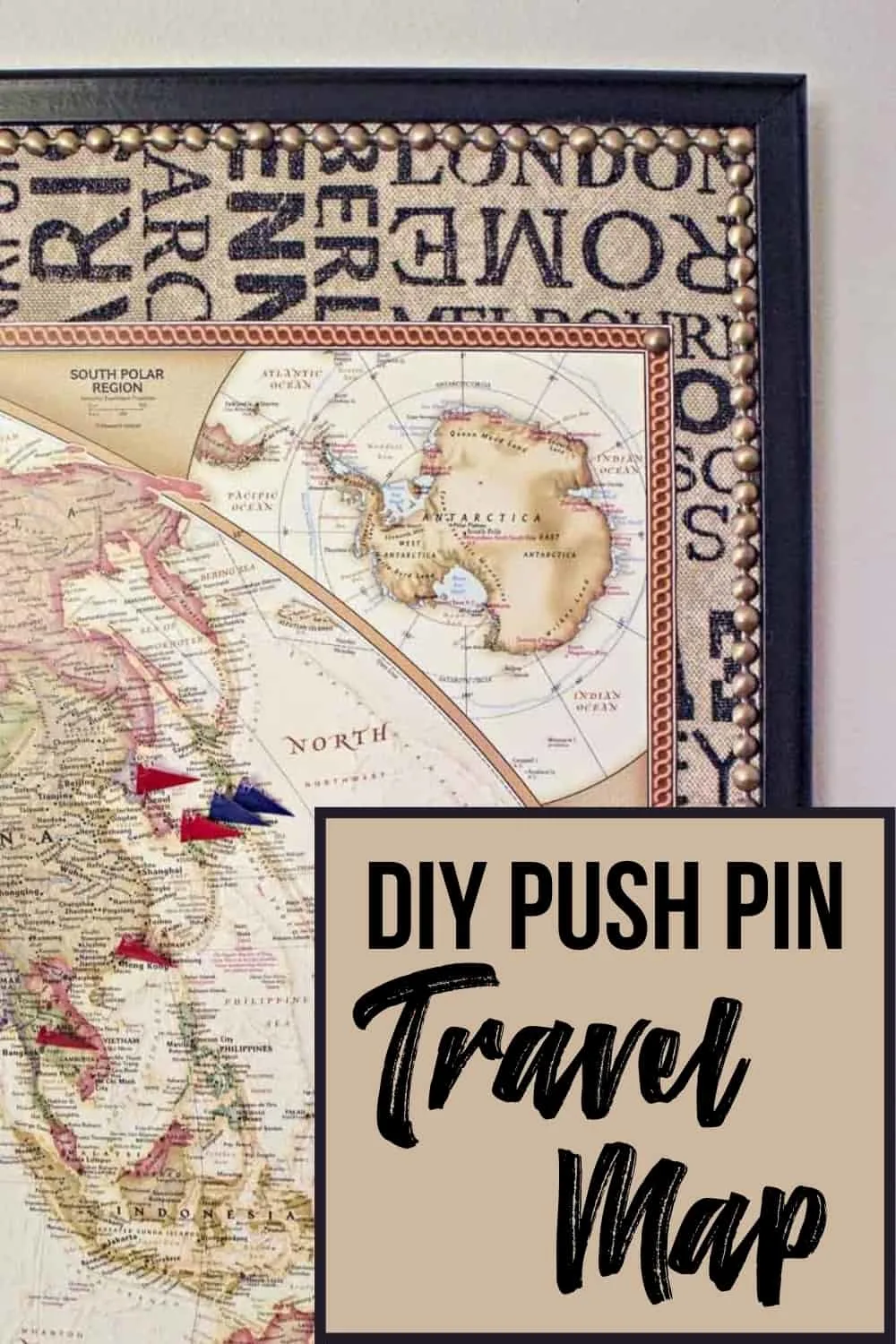 DIY push pin travel map with text overlay