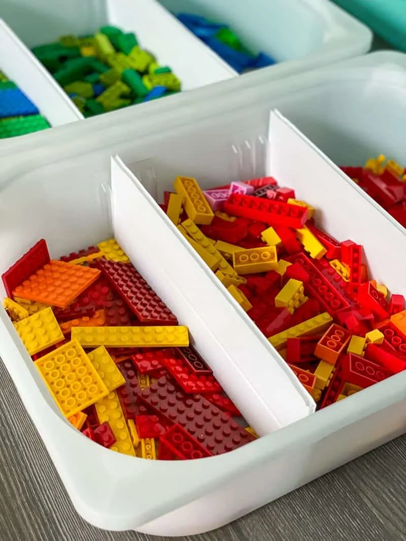 lego pieces sorted into bins with DIY drawer dividers